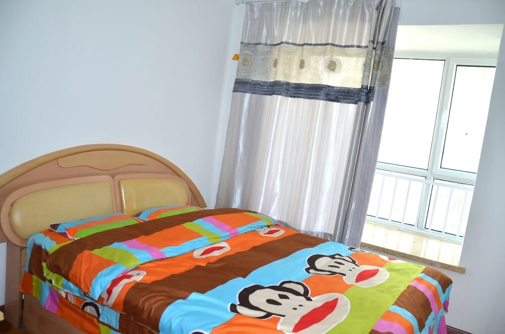 Фото Lanzhou Longshang Mingzhu Apartment Two-bedroom suite