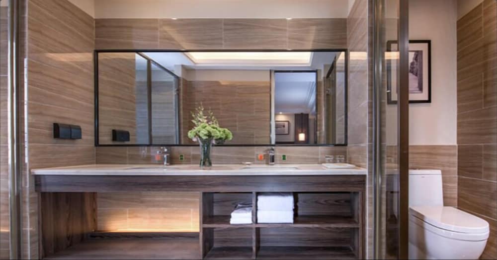 Фото Auden International Hotel