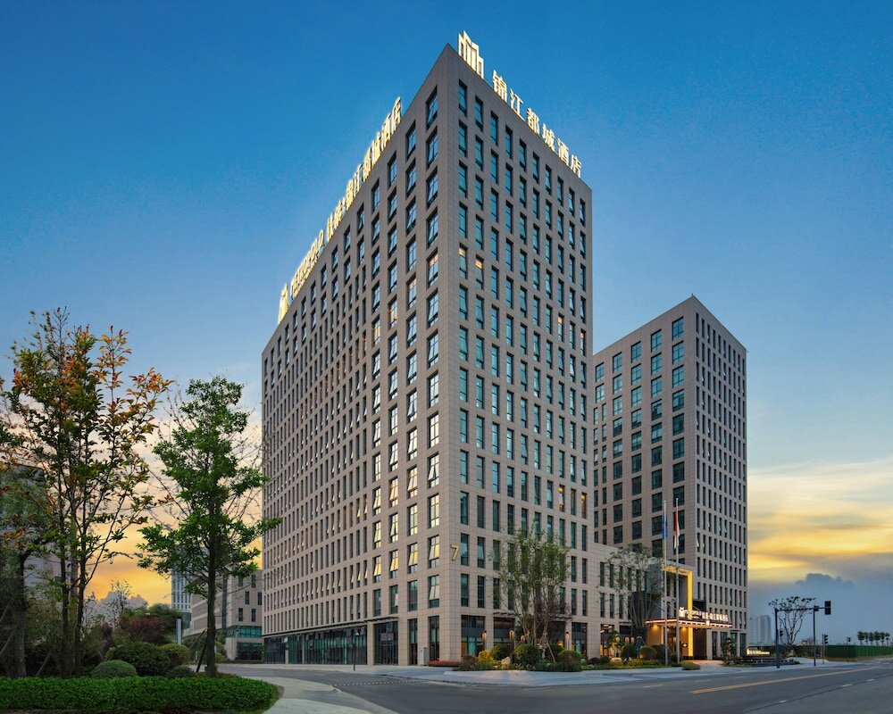 Фото Tiegang Jinjiangduchengjiudian