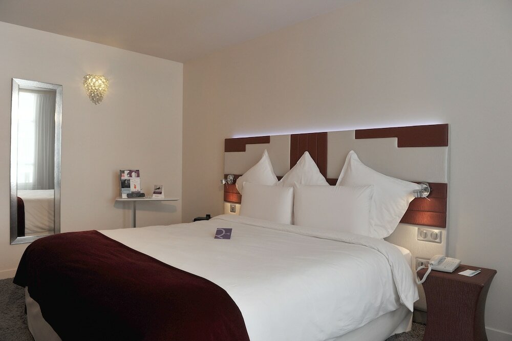 Фото Mercure Paris Opéra Faubourg Montmartre