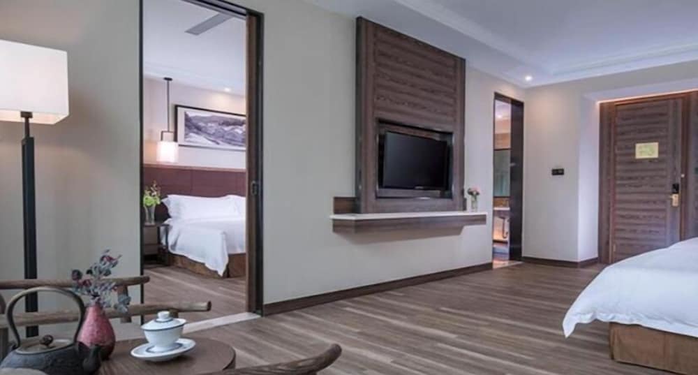 Фото Auden International Hotel