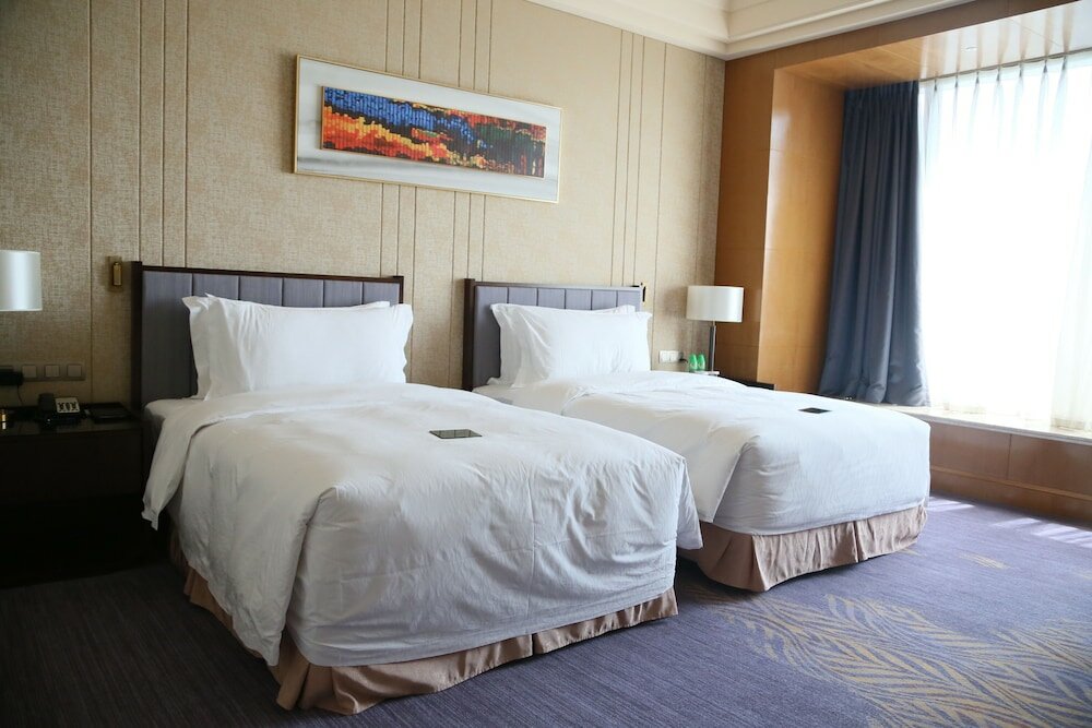 Фото Chateau Star River Qing Dao