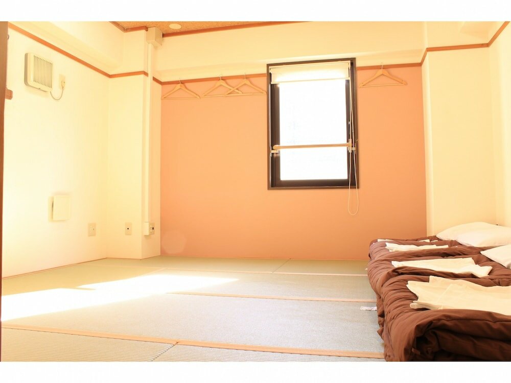 Фото T&k Hostel Kobe Sannomiya East