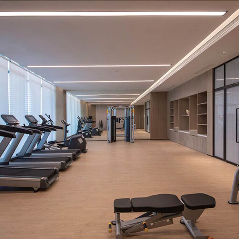 Фото New Century Hotel Zhenhai