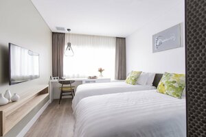 Гостиница The Kingsford Brisbane Airport Hotel