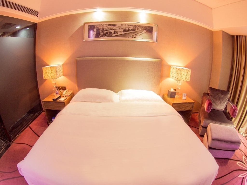 Фото La Perle International Hotel