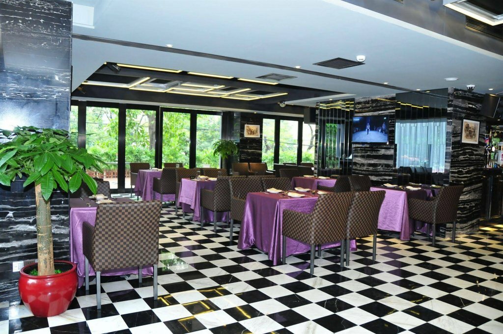 Фото La Perle International Hotel