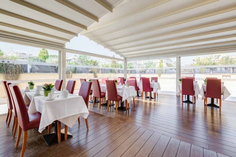 Фото Romoli Hotel