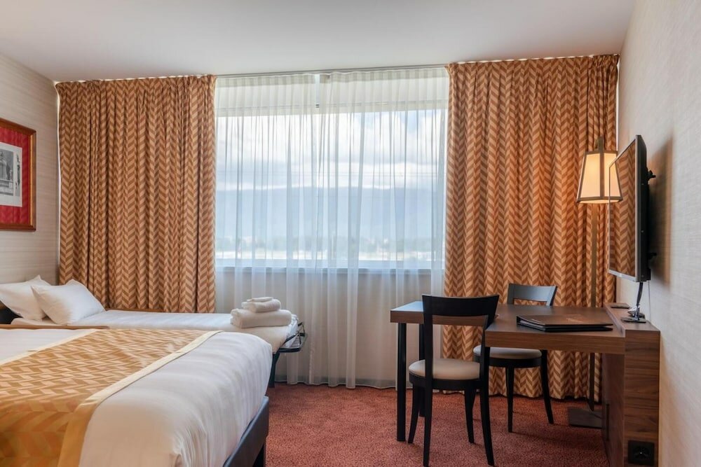 Фото Nash Suites Airport Hotel