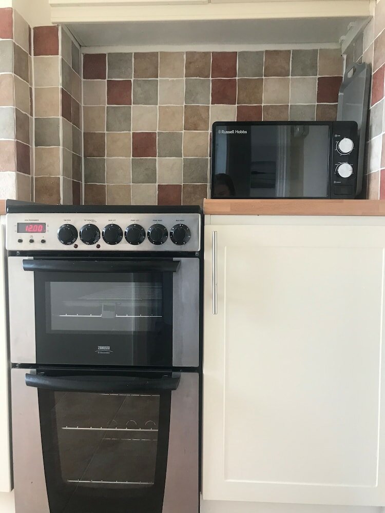 Фото Coastal Apartment