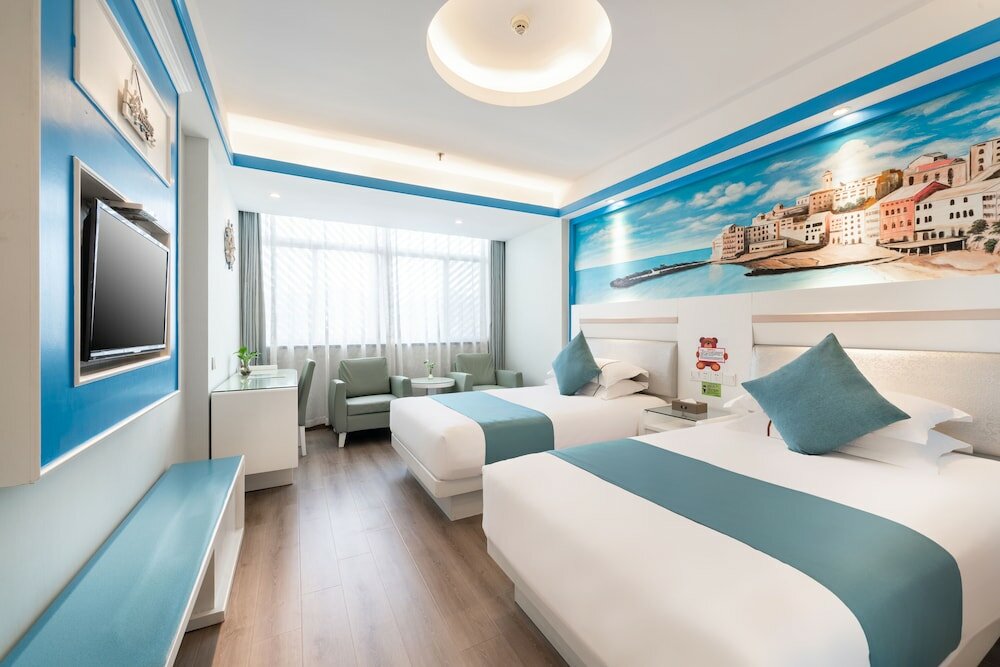 Фото Yiwu Baide Theme Hotel