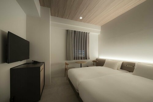 Гостиница Nest Hotel Hiroshima Ekimae в Хиросиме