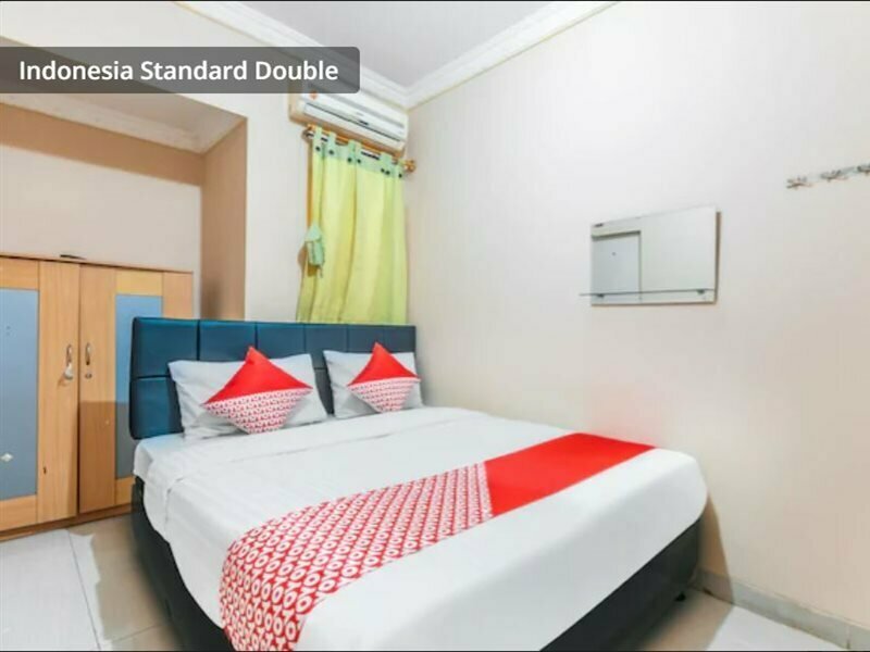 Hotel Oyo 2765 Mulia Raja Kost, Earth, photo