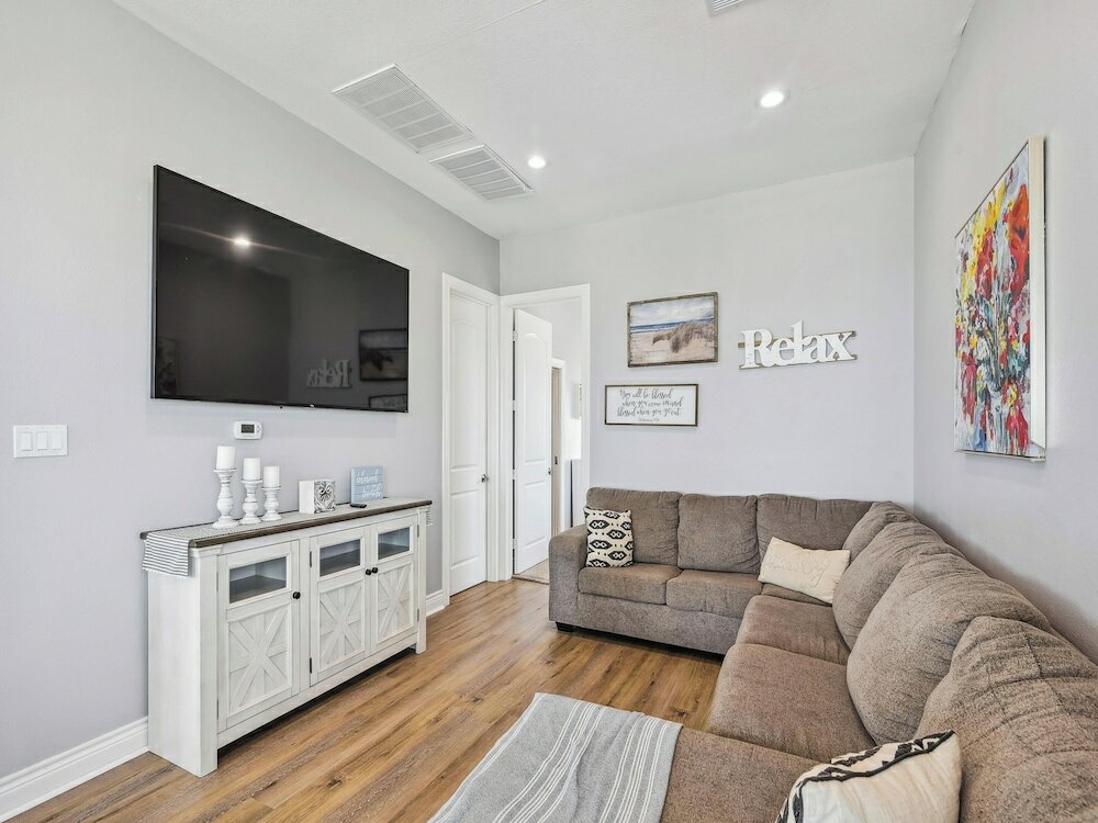 Фото Sand and Sun Beachfront