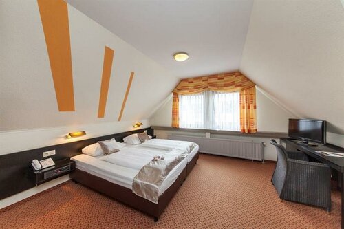 Гостиница Novum Hotel Strohgäu в Дитцингене