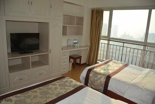 Гостиница GreenTree Inn Weihai North Qingdao Road Express Hotel в Вэйхае