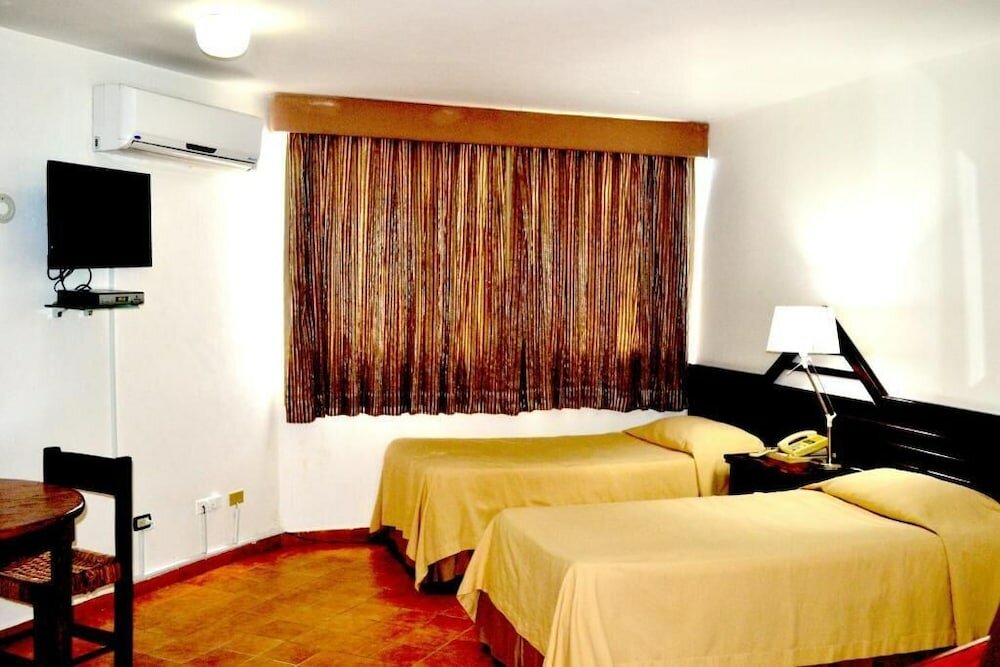 Фото Aparta Hotel Plaza del Sol