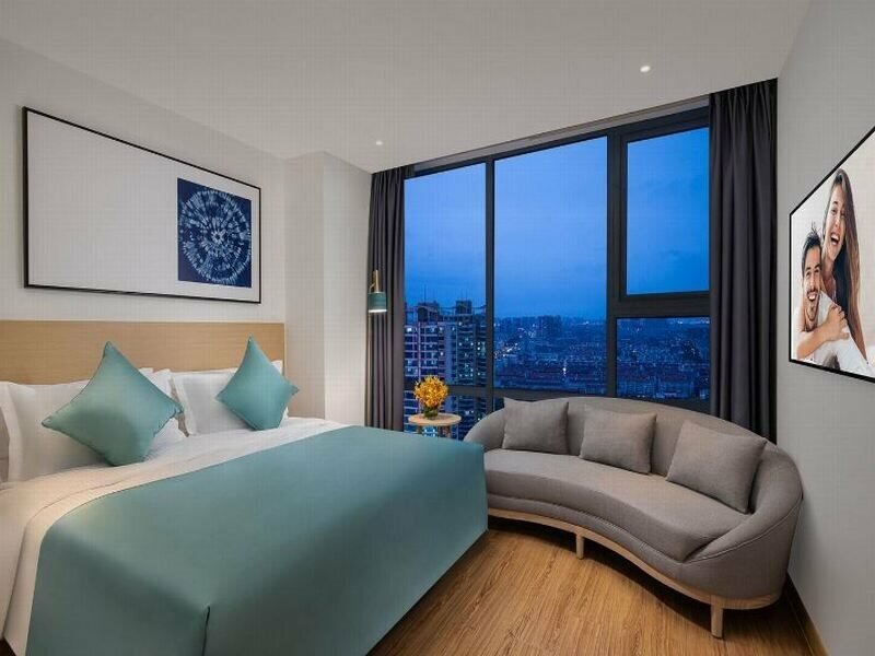 Фото Joysuites Nantong