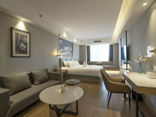 Гостиница Magnotel Hotel в Ляояне