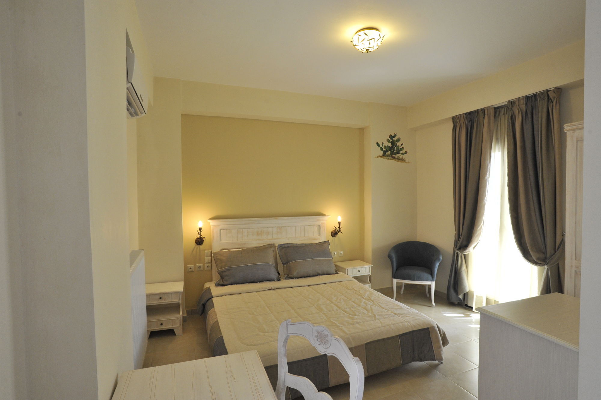 Фото Porto Mani Suites