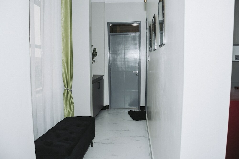 Фото Cozy Oasis Kyanja