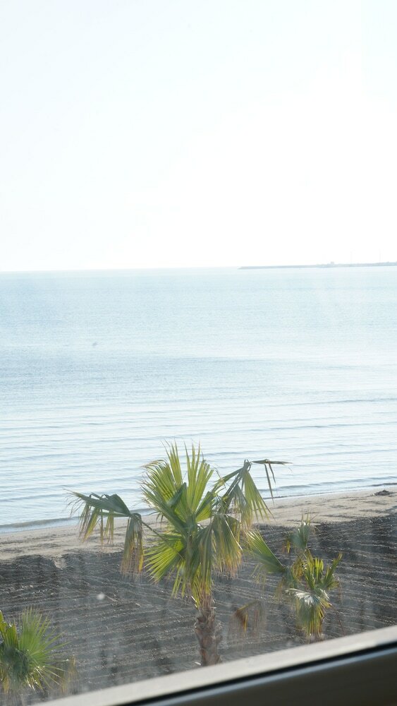 Фото The Beachfront Apartment