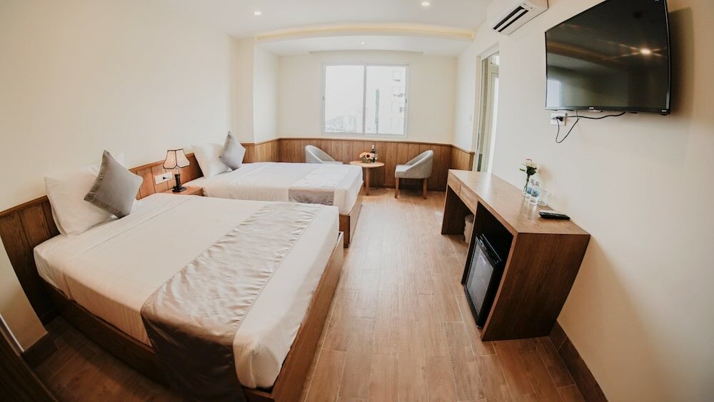 Фото Quang Vinh Hotel