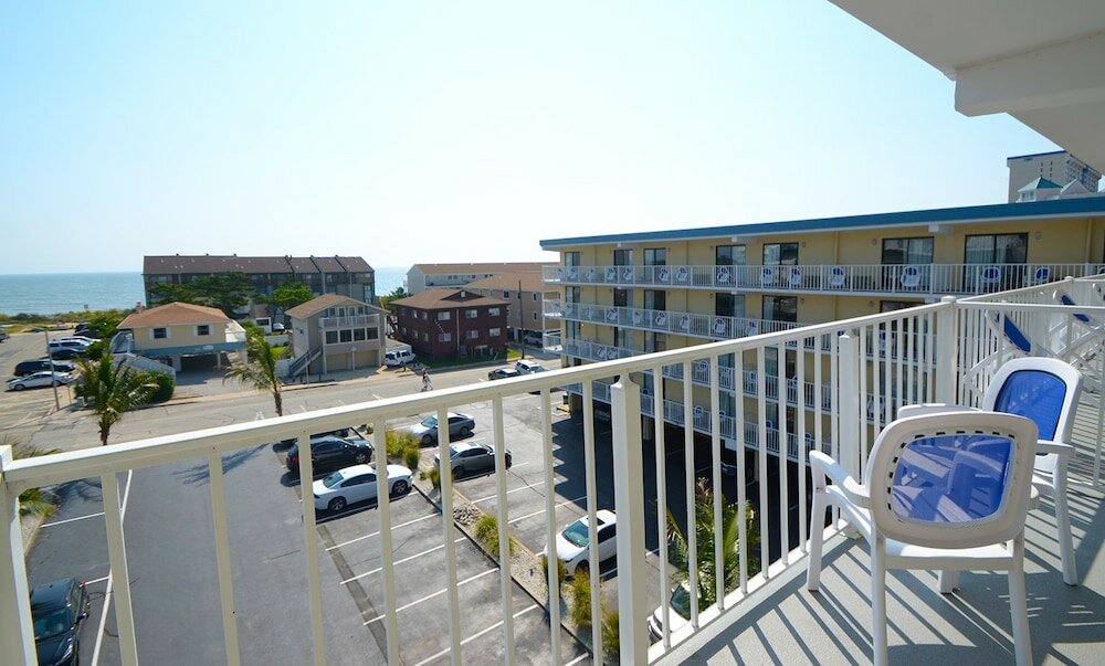 Фото Coastal Palms Inn & Suites