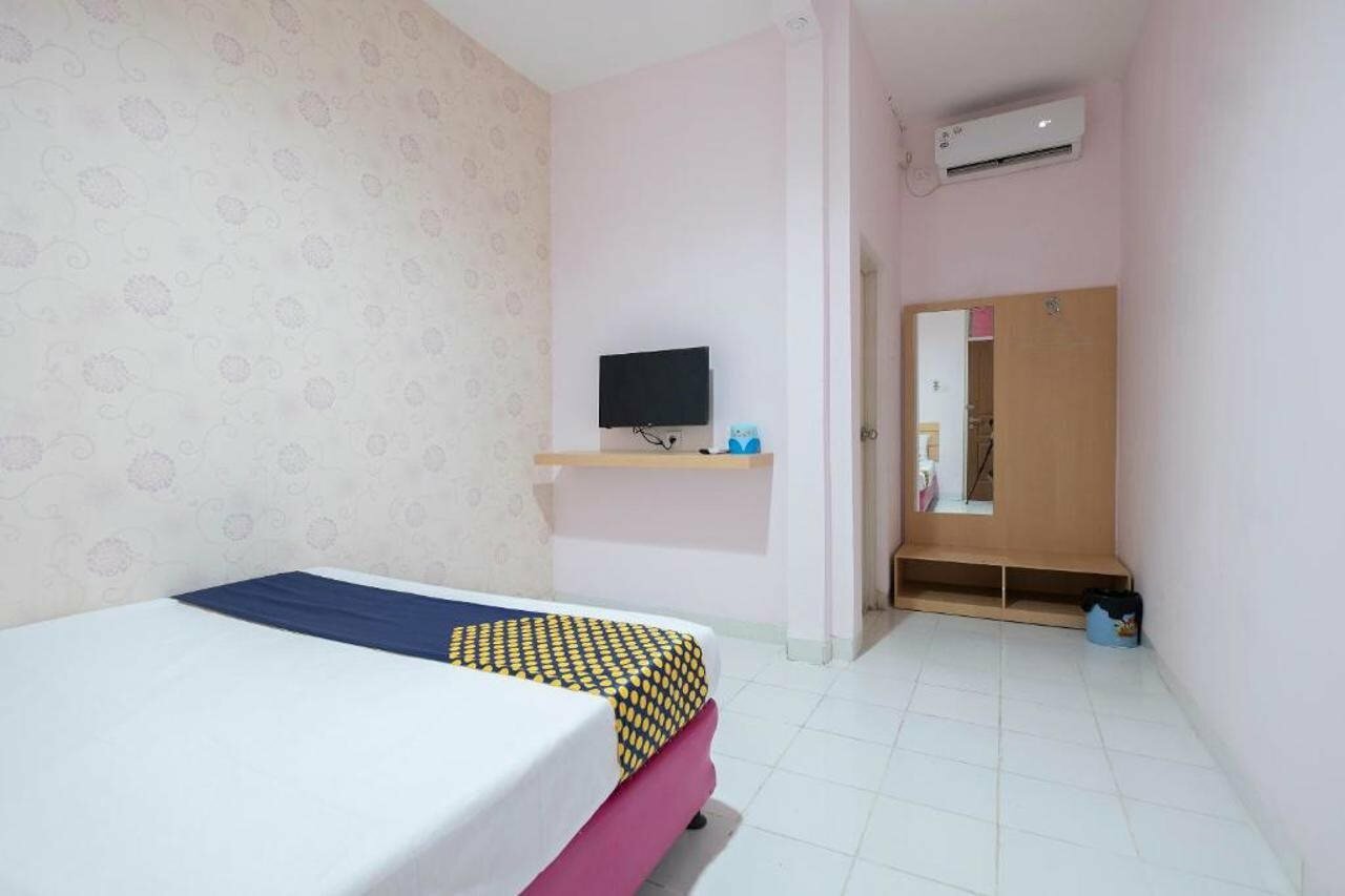 Фото Spot On 2214 Wisma Jampea