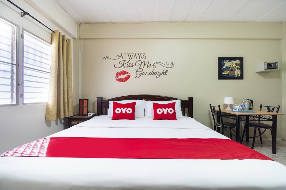 Фото Oyo 838 Aromdee Apartment