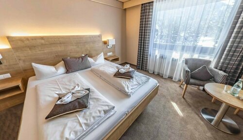 Внешний вид отеля Hotel Quellenhof в Грейнау, фото 2