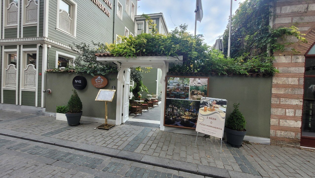 Entrance to Yeşil Ev Garden Restaurant, a serene courtyard dining spot—perfect choice for visitors wondering where to eat near Hagia Sophia.
