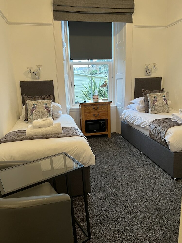 Фото Bythesea Guest House