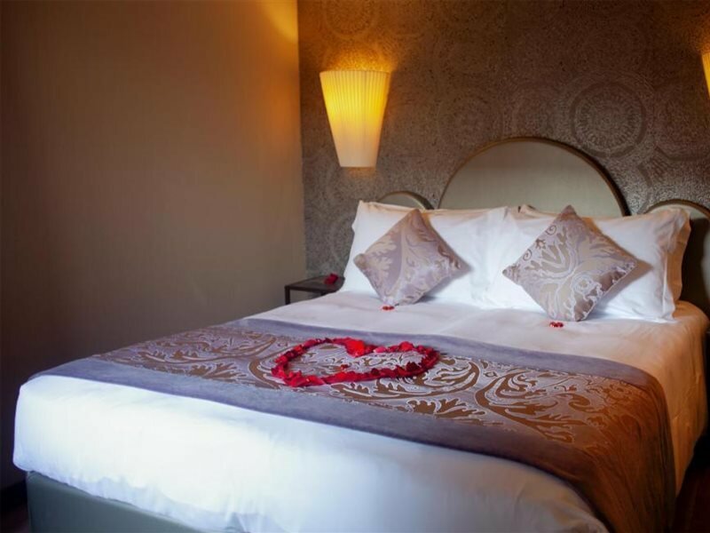 Фото Alle Guglie Boutique Hotel
