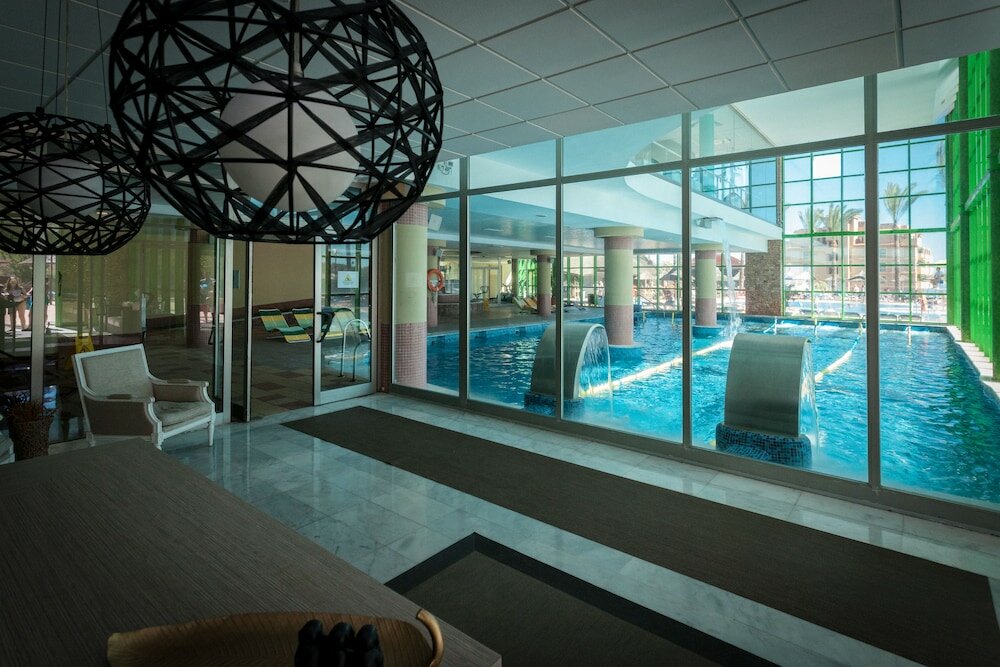 Фото Holiday World Riwo Hotel