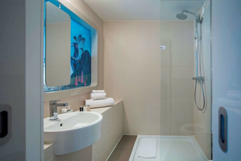 Фото Hotel Le Marcel Paris Gare de l'Ést