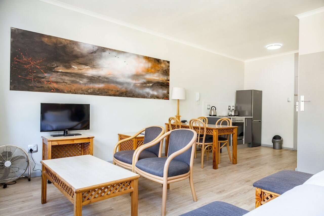 Фото Gardens Centre Holiday Apartments