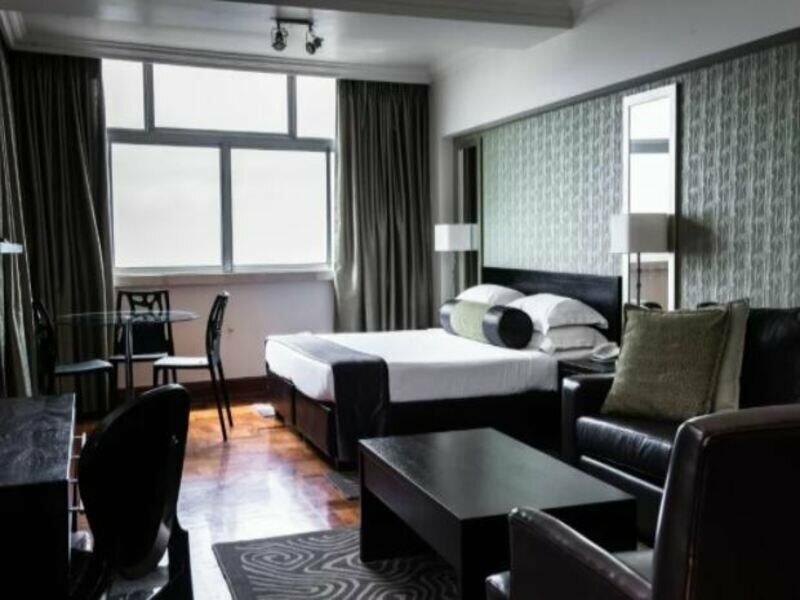 Фото Belaire Suites Hotel