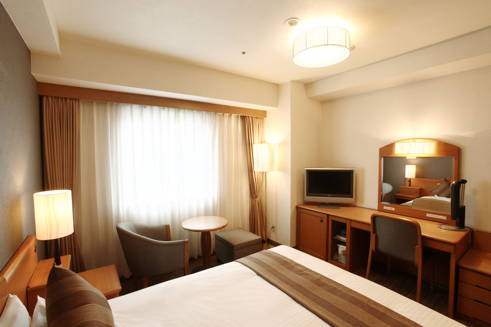 Фото Okayama Koraku Hotel