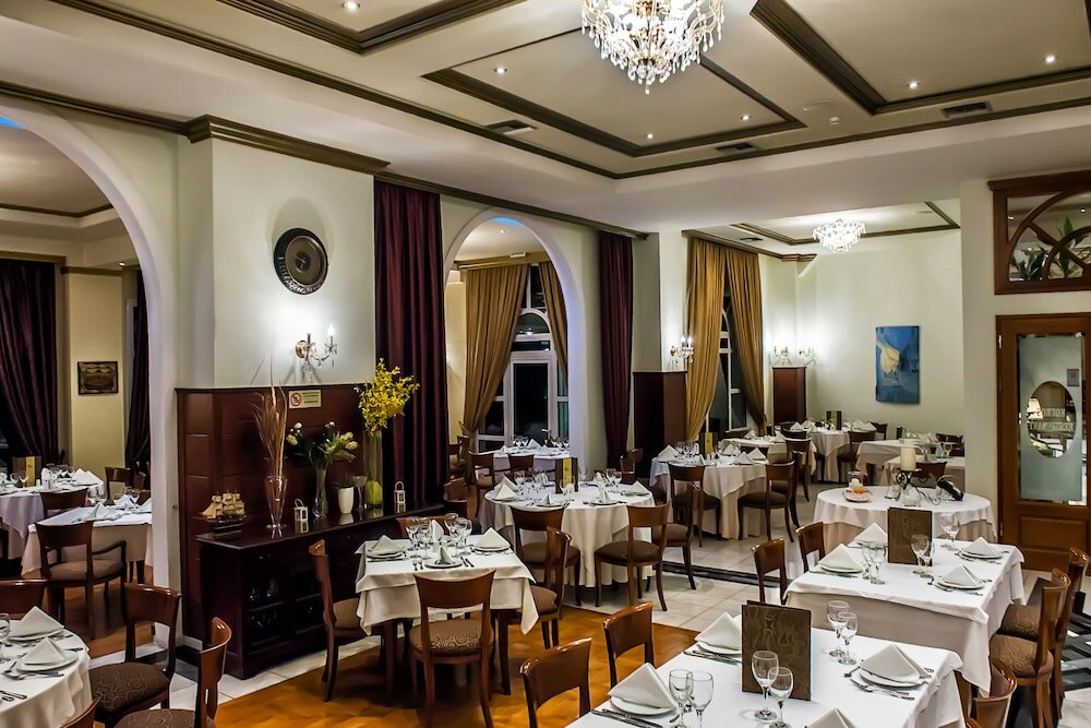 Фото Kouros Hotel