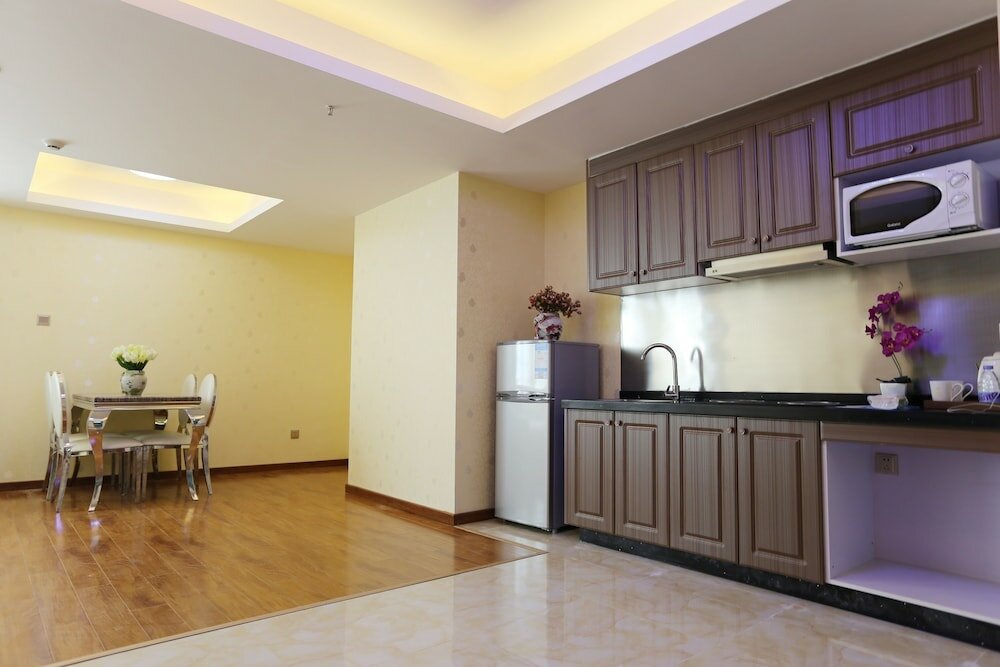 Фото Nomo Service Apartment The Legend