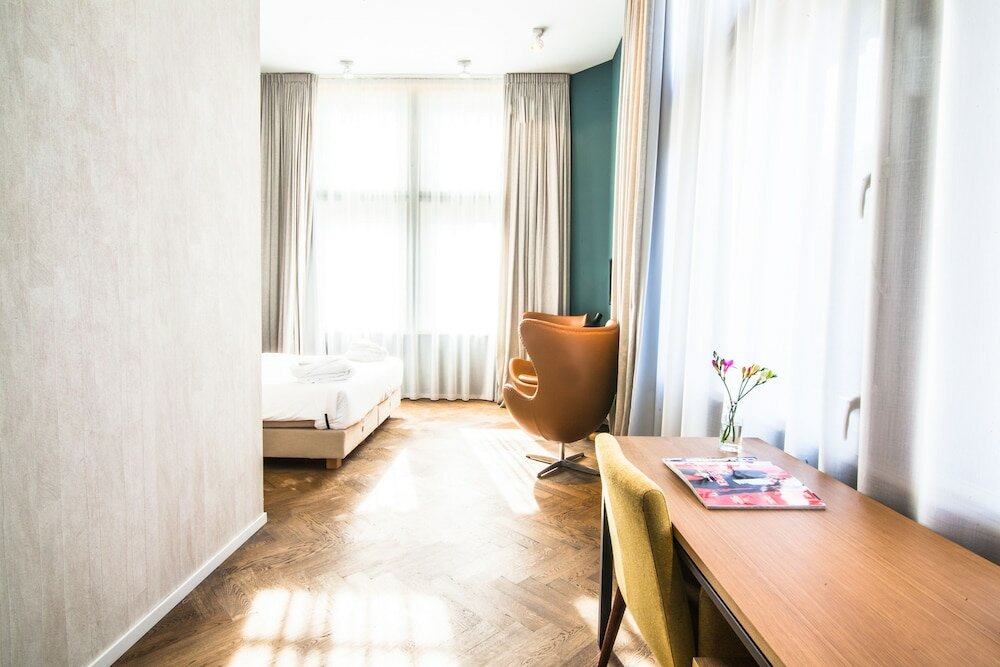 Фото Hotel De Hallen