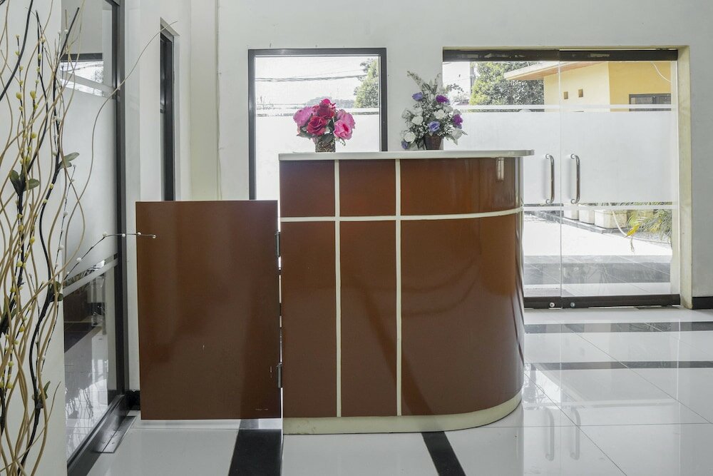 Фото Oyo 2319 Tengkawang Residence