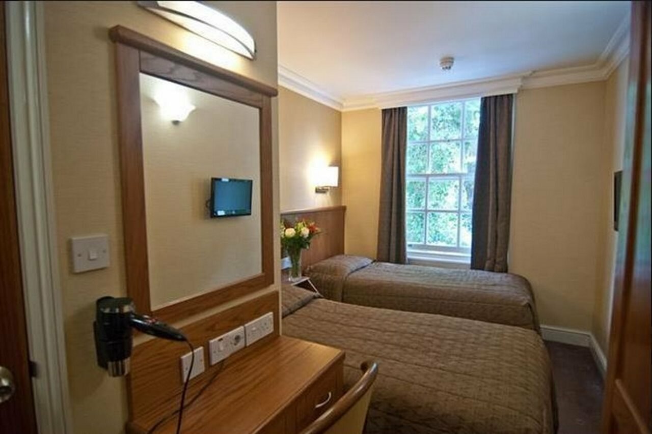 Фото Orchard Hotel