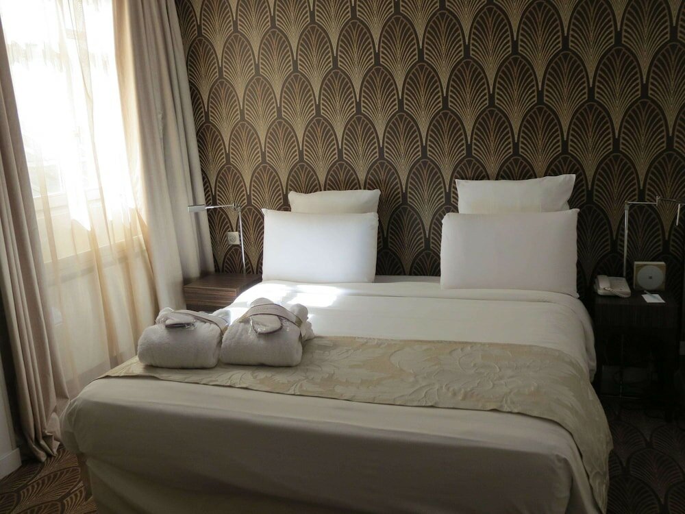 Фото Mercure Paris Opéra Faubourg Montmartre