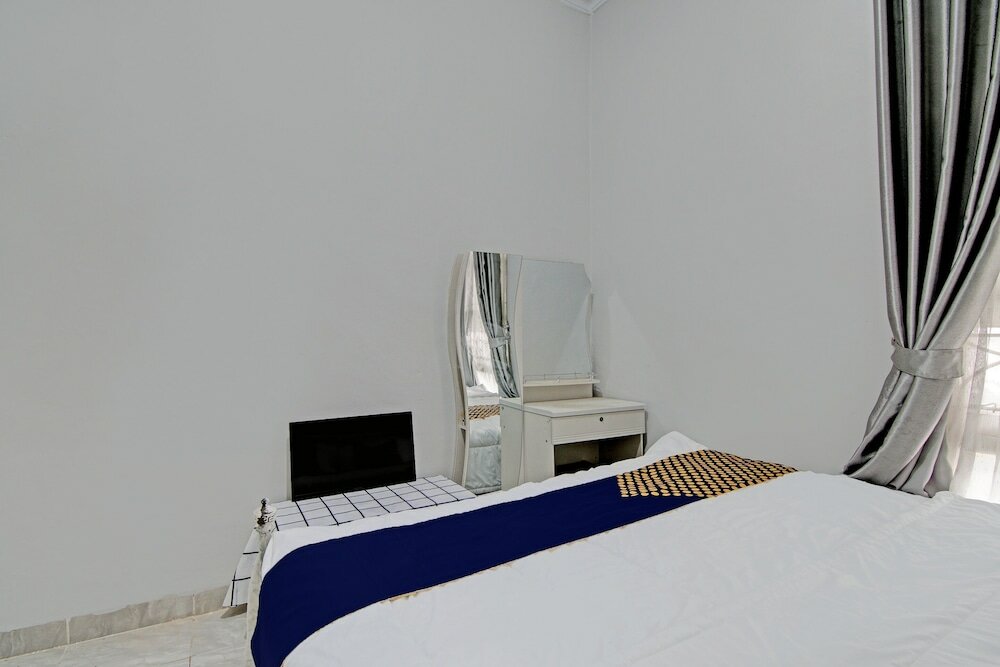 Фото Spot On 92536 Teguh Homestay Syariah