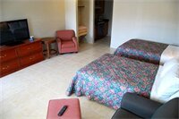 Фото Bedtime Inn & Suites