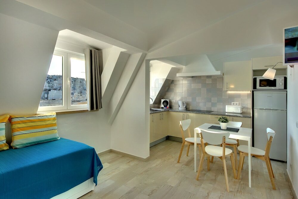 Фото Apartamentos Tucha