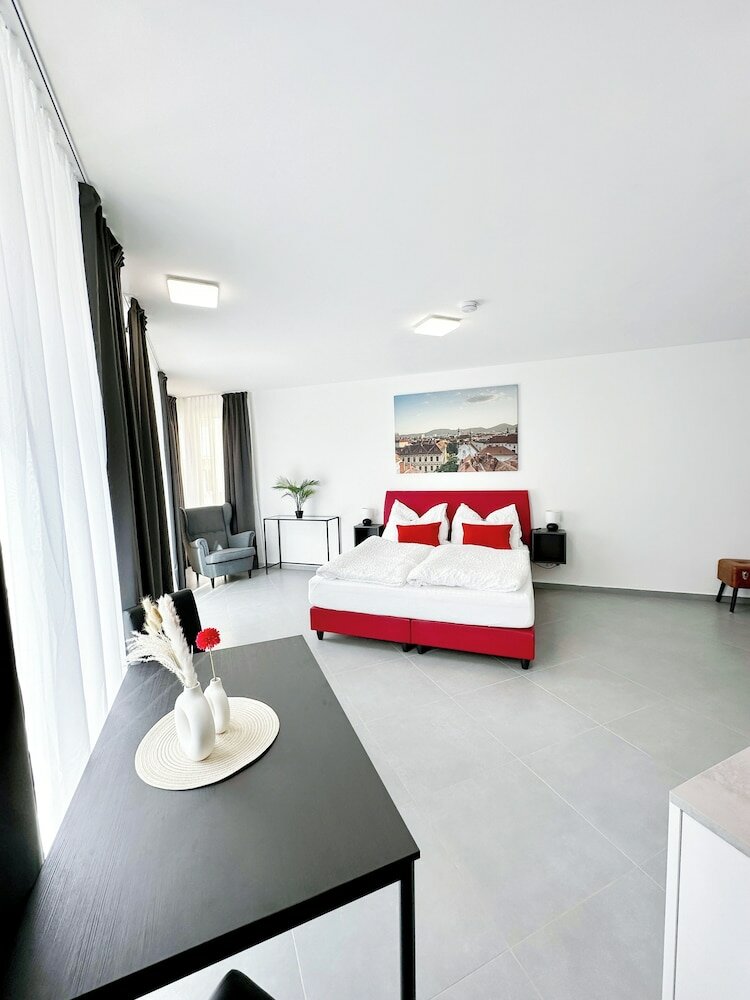 Фото Grazora Living Apartments