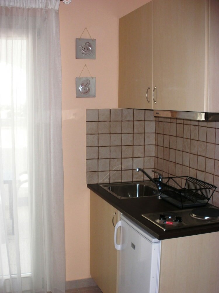 Фото Blue Harmony Apartments